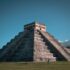 people walking near the el castillo