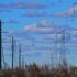 low angle view of posts under blue calm sky