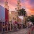 view of the merida church towers from the street