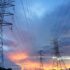 transmission tower under gray sky